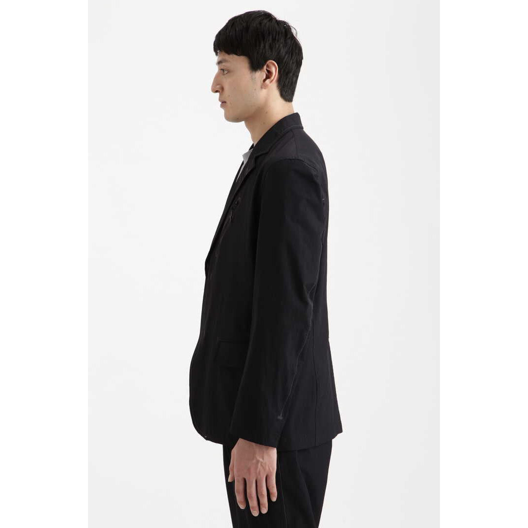 AND WANDER plain tailored stretch jacket